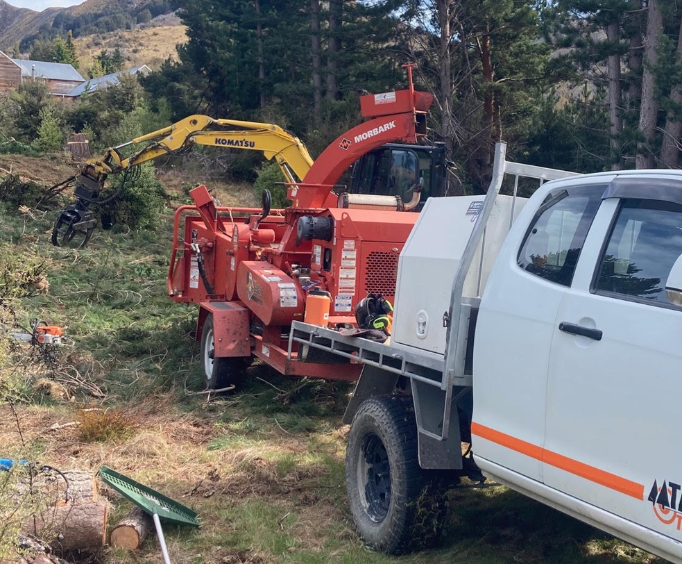 Chipping branches into mulch